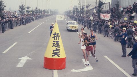 Runners reach the turn-around point of the marathon event.