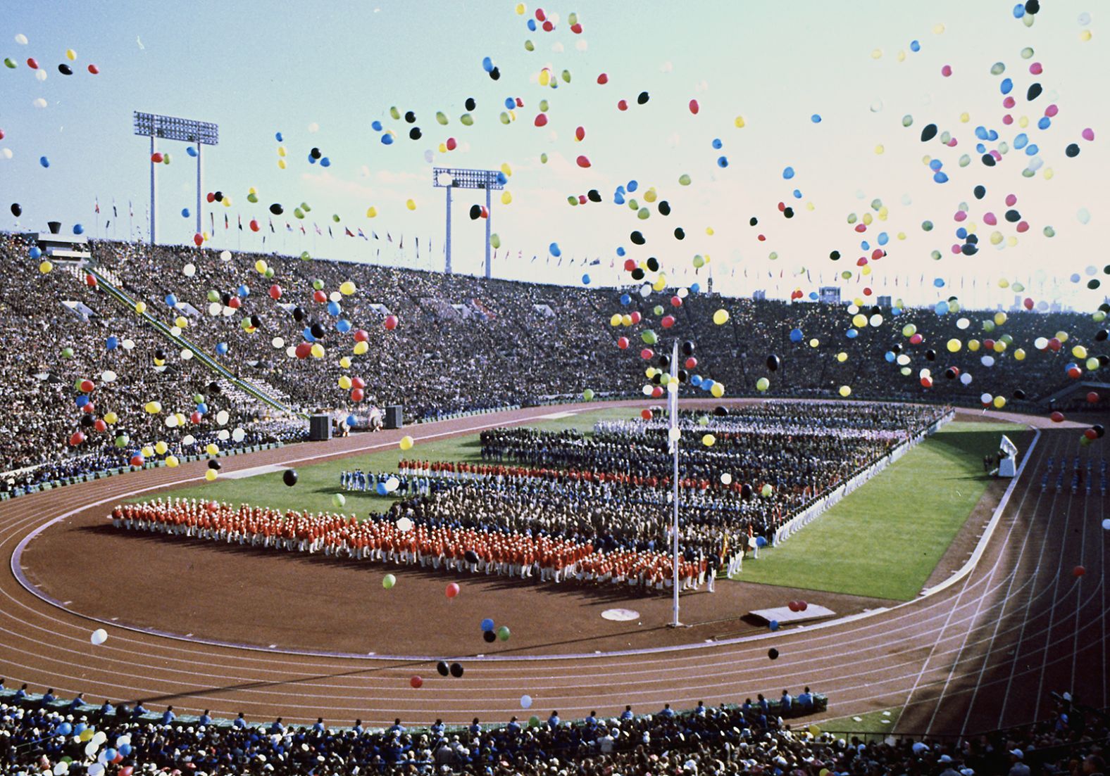 Balloons float over the National Stadium during the opening ceremony.