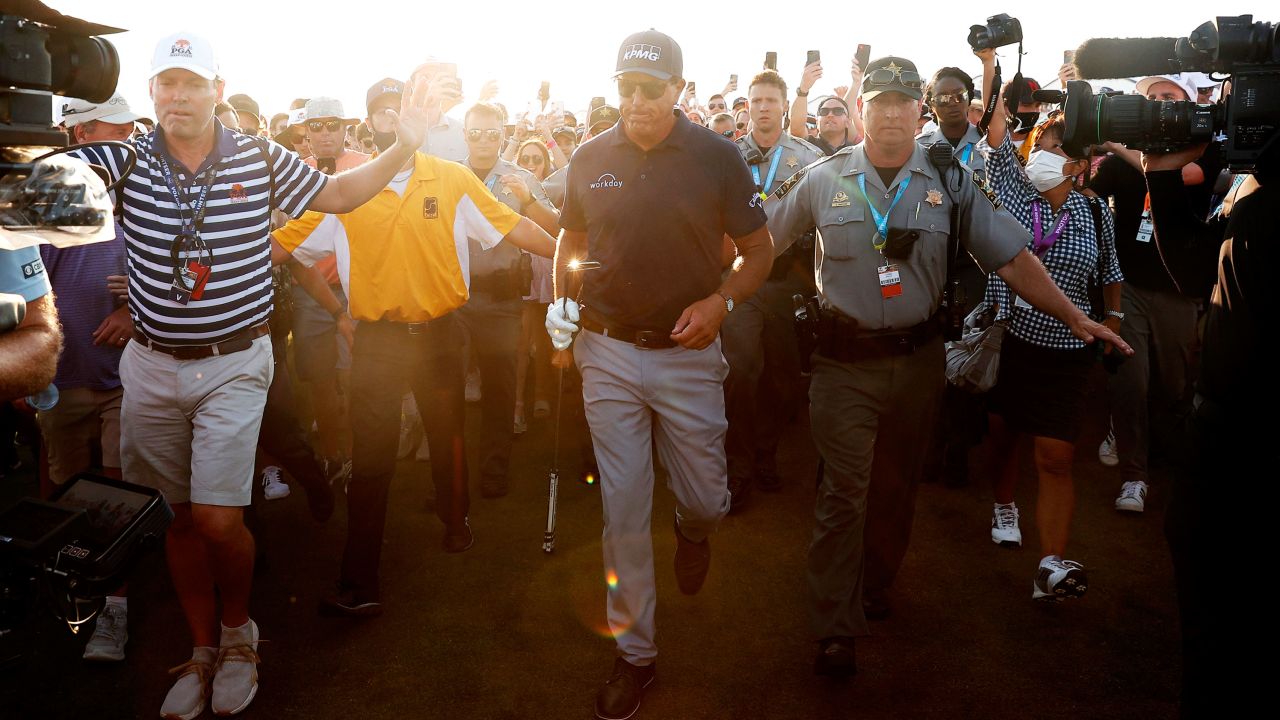 Mickelson walks the 18th fairway before winning the 2021 PGA Championship.