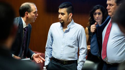 Cristhian Bahena Rivera speaks to a court interpreter during his trial on May 26, 2021.