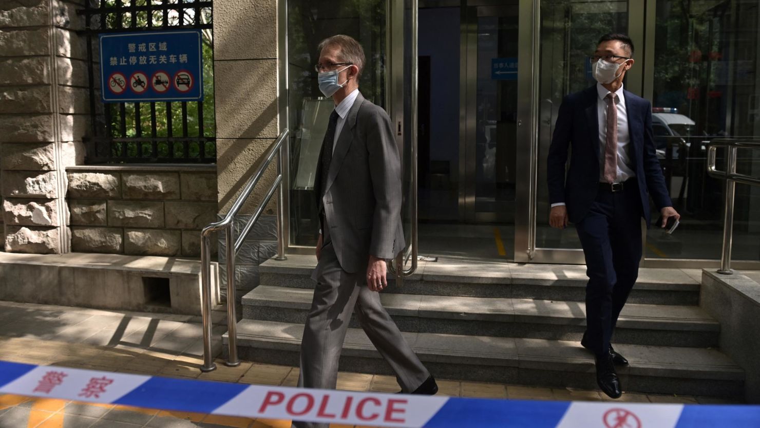 Australian ambassador to China Graham Fletcher walks out of an entrance to the Beijing No. 2 Intermediate People's Court after being refused access to the trial of Yang Hengjun.