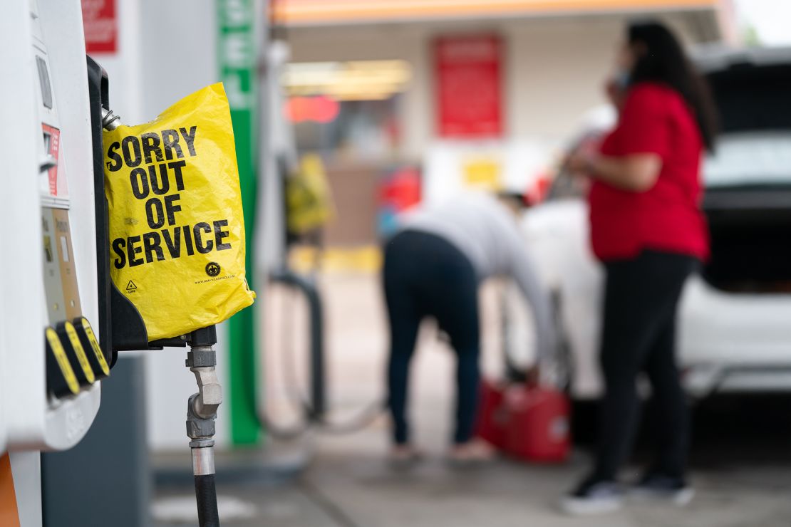 An out of service bag covers a pump handle at a gas station on May 12 in Fayetteville, North Carolina, caused by the shutdown of the Colonial Pipeline due to a cyber attack. While that shutdown is over, experts worry that a shortage of tank truck drivers could bring about a repeat of gas shortages this summer.