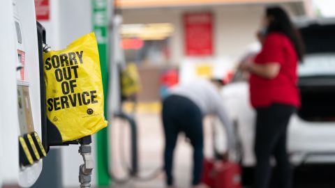 An out of service bag covers a pump handle at a gas station on May 12 in Fayetteville, North Carolina, caused by the shutdown of the Colonial Pipeline due to a cyber attack. While that shutdown is over, experts worry that a shortage of tank truck drivers could bring about a repeat of gas shortages this summer.