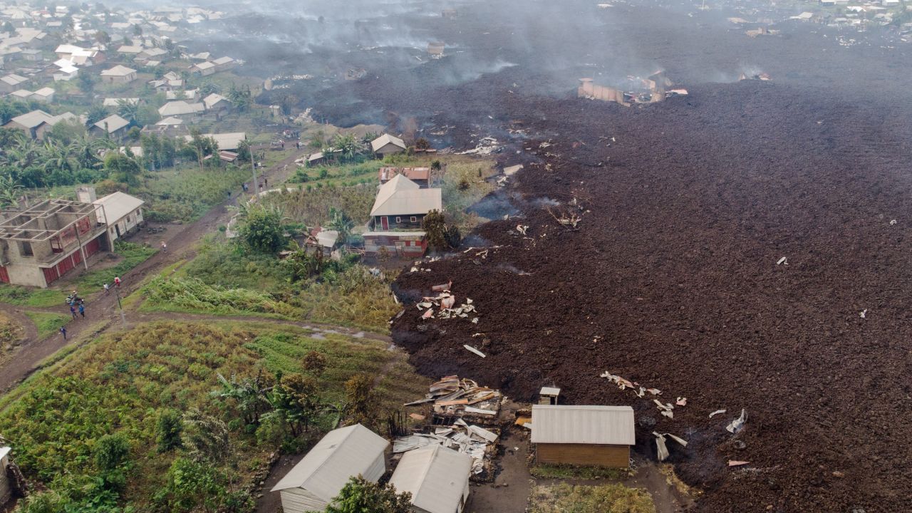 An aerial view shows debris engulfing buildings in Bushara village, near Goma, on May 23.
