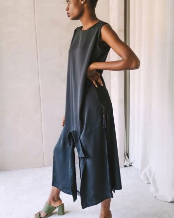 Now his style is more minimalist. Clean lines, loose fabrics and muted shades dominate his recent designs, such as this dress from the Spring/Summer 2021 "Hiding Place" collection. 