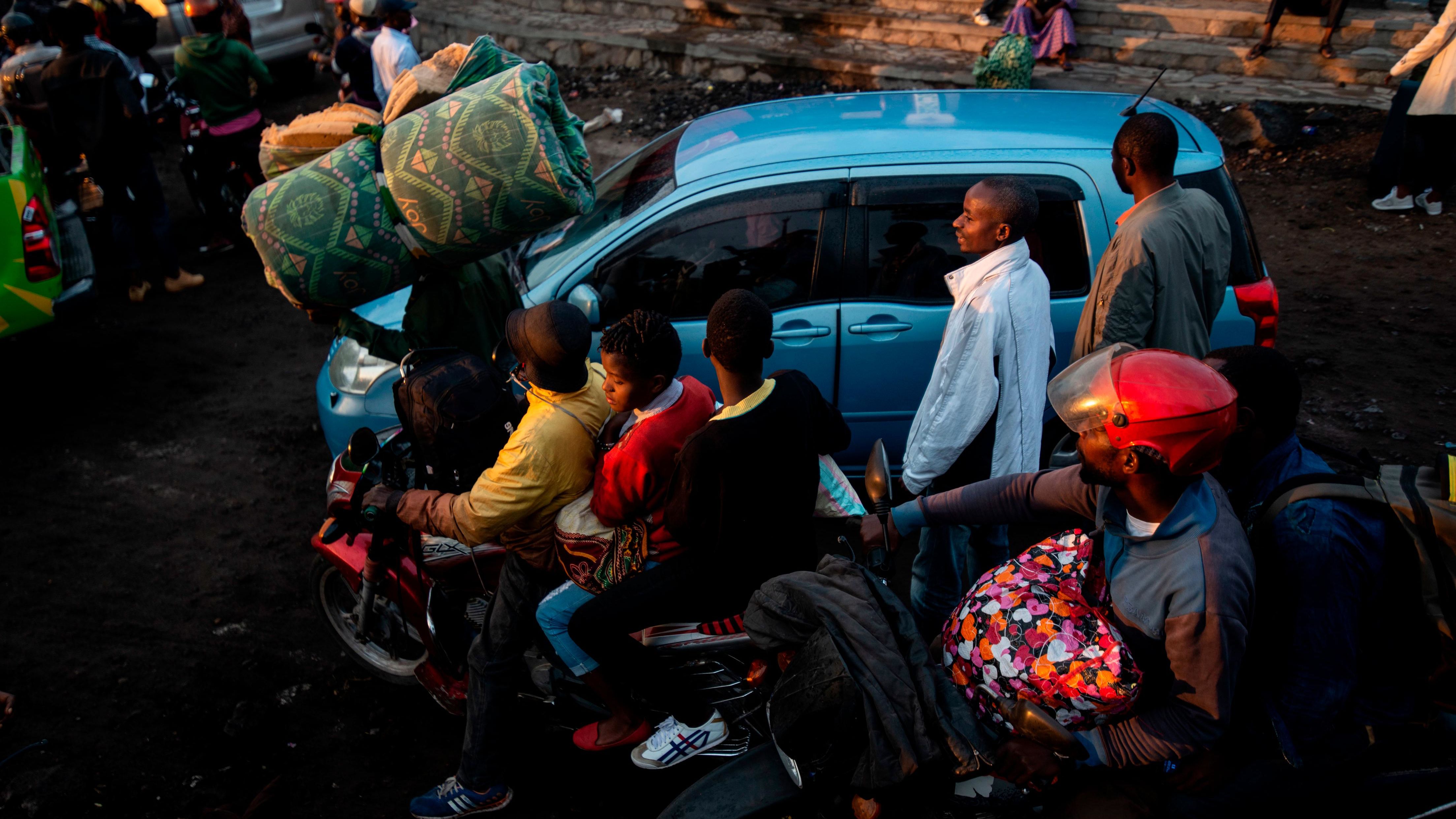 Residents flee Goma on Thursday, May 27, after an evacuation order was issued.