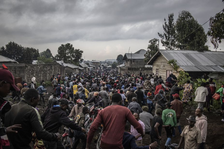 People in Goma start to run after the ground trembled briefly on May 23.