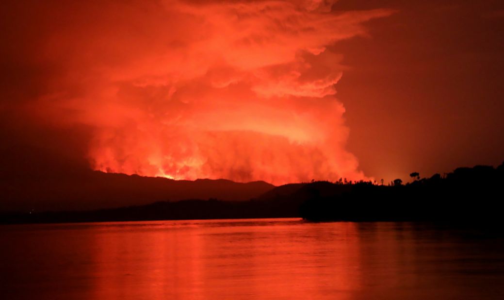 The volcano's smoke and flames are seen from Tchegera Island on Lake Kivu, near Goma, on May 22.