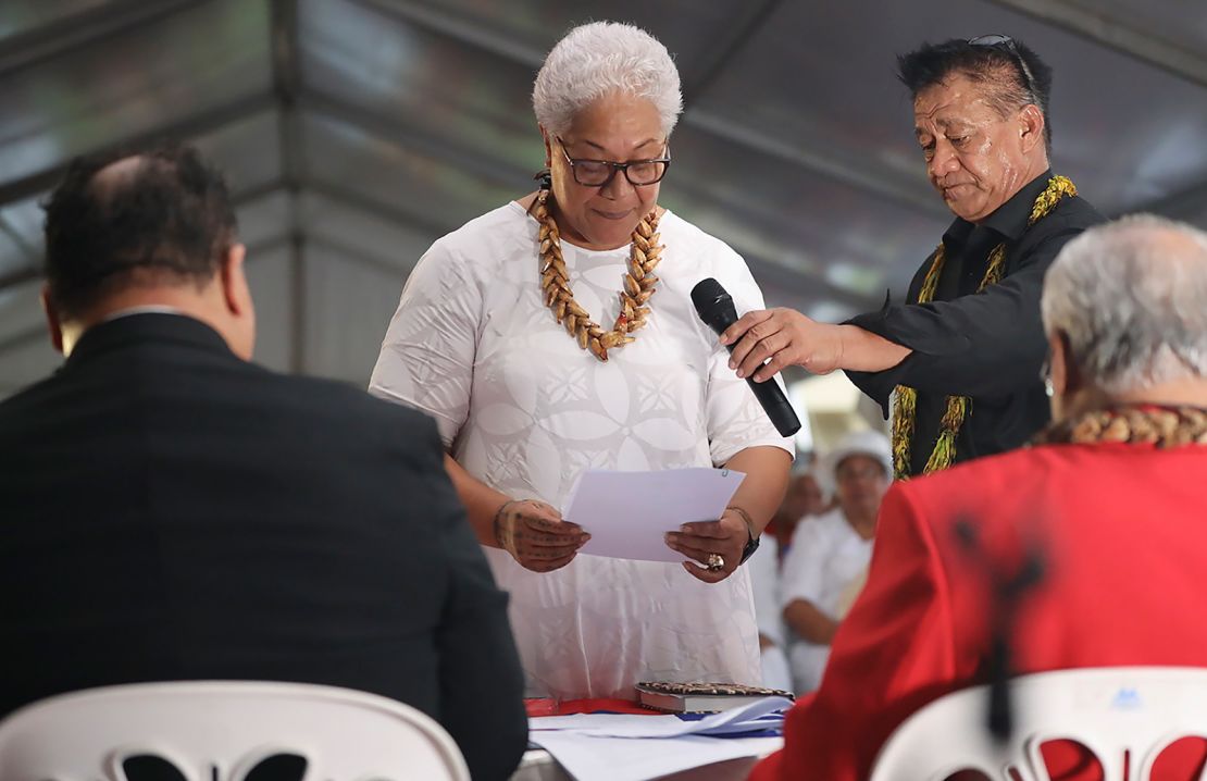 Samoa's Prime Minister-elect Fiame Naomi Mata'afa takes her oath at an unofficial ceremony outside parliament house in Apia, Samoa, on May 24, 2021. 
