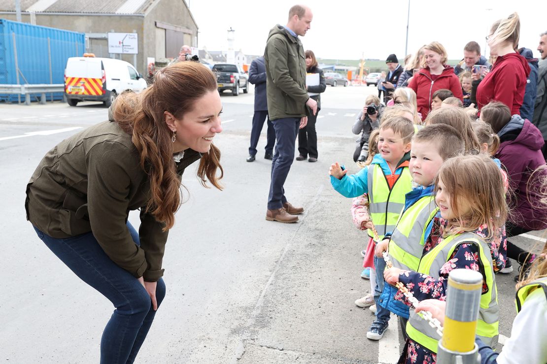 Catherine, Duchess of Cambridge speaks to school children while visiting the European Marine Energy Centre in Stromness on day five of their week-long Scottish trip. 