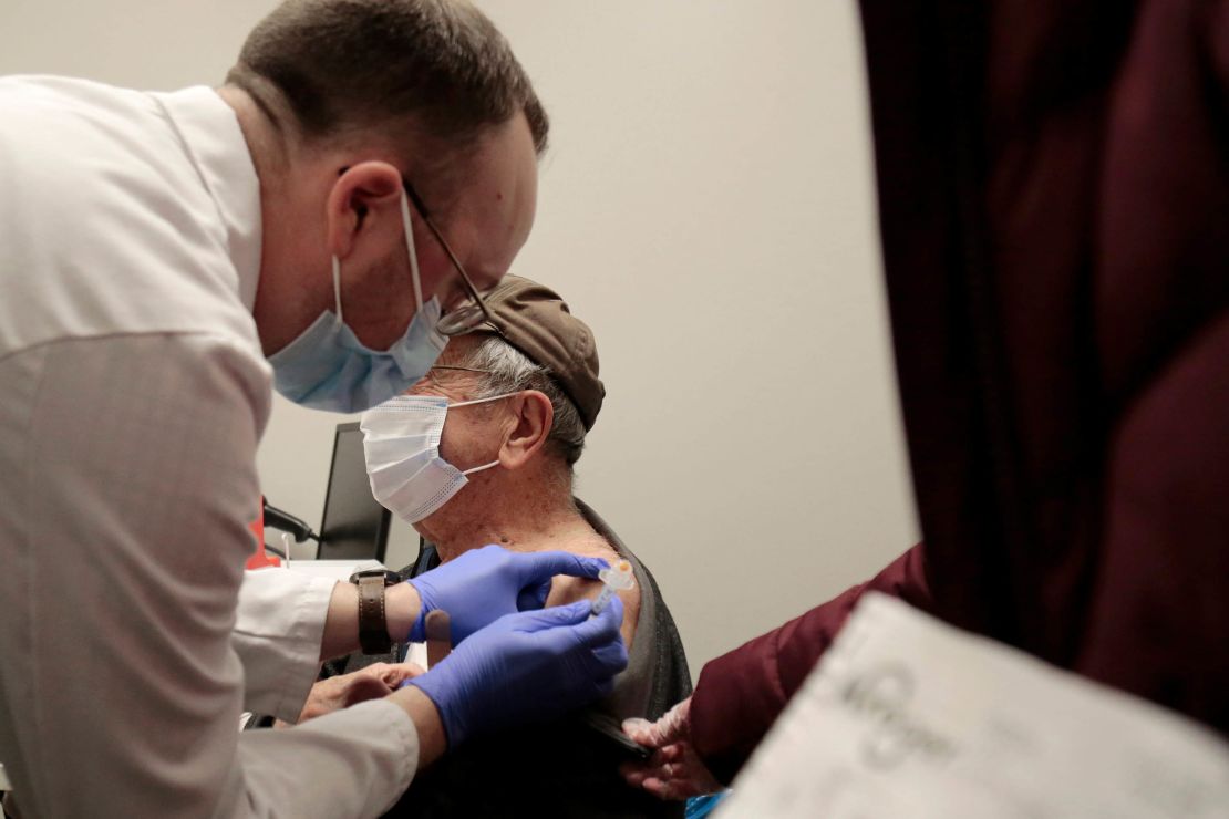 A man receives a Covid-19 vaccine at a Kroger pharmacy in Ohio.