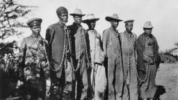 German South-West Africa: Herero rebellion, captives in chains - 1904/5 (Photo by ullstein bild/ullstein bild via Getty Images)
