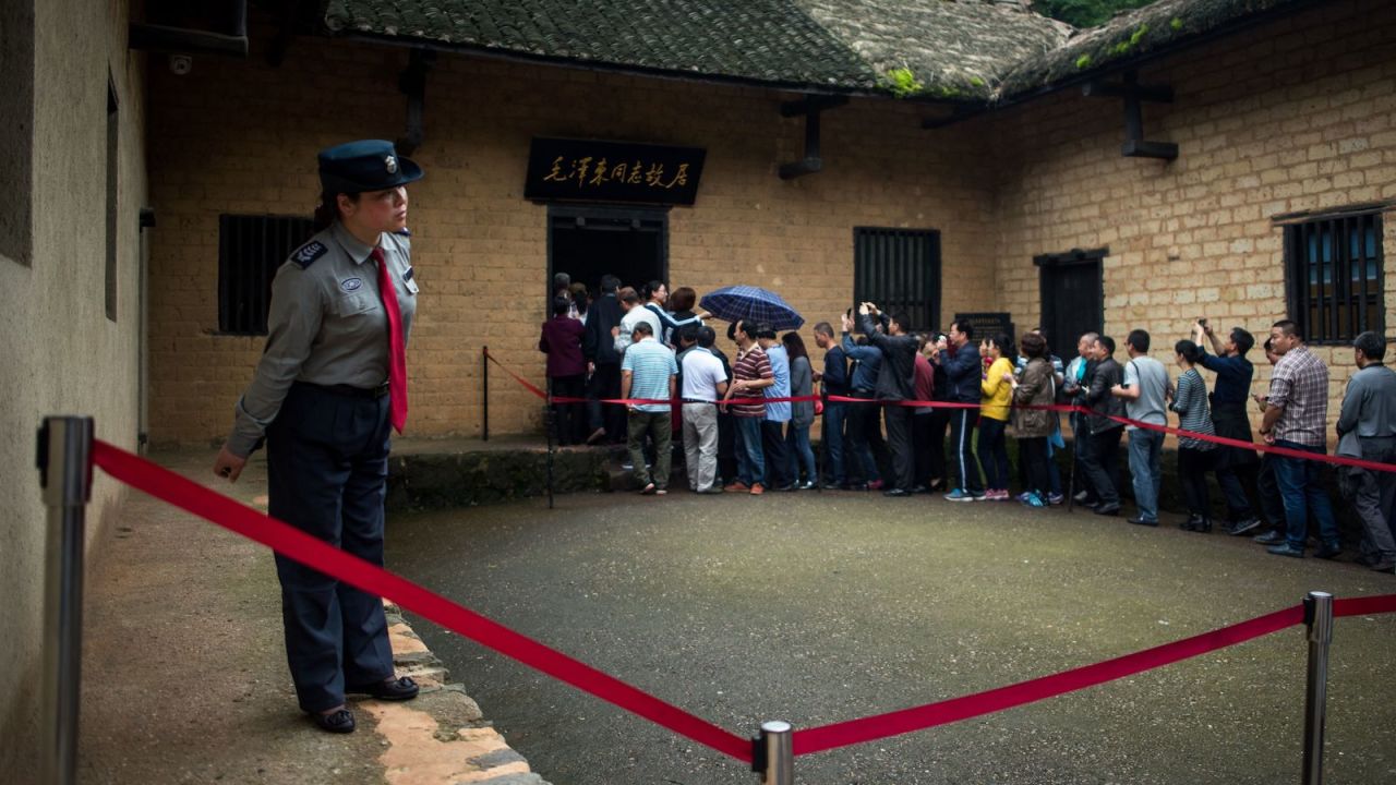 Tourists queue to enter the former residence of Communist leader Mao Zedong in 2016 in Shaoshan, in China's Hunan province.