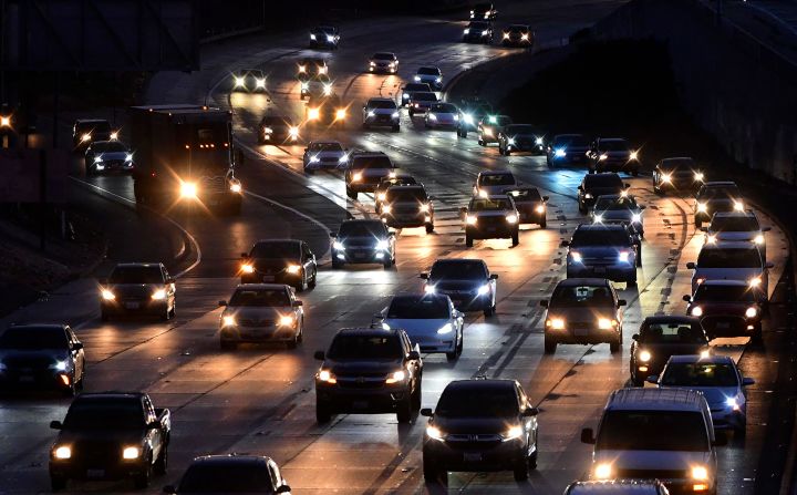 Vehicles head east out of Los Angeles on Interstate 10 in Alhambra, California, on Thursday. More than 37 million people were expected to travel 50 miles or more from home between Thursday and Monday, according to AAA.