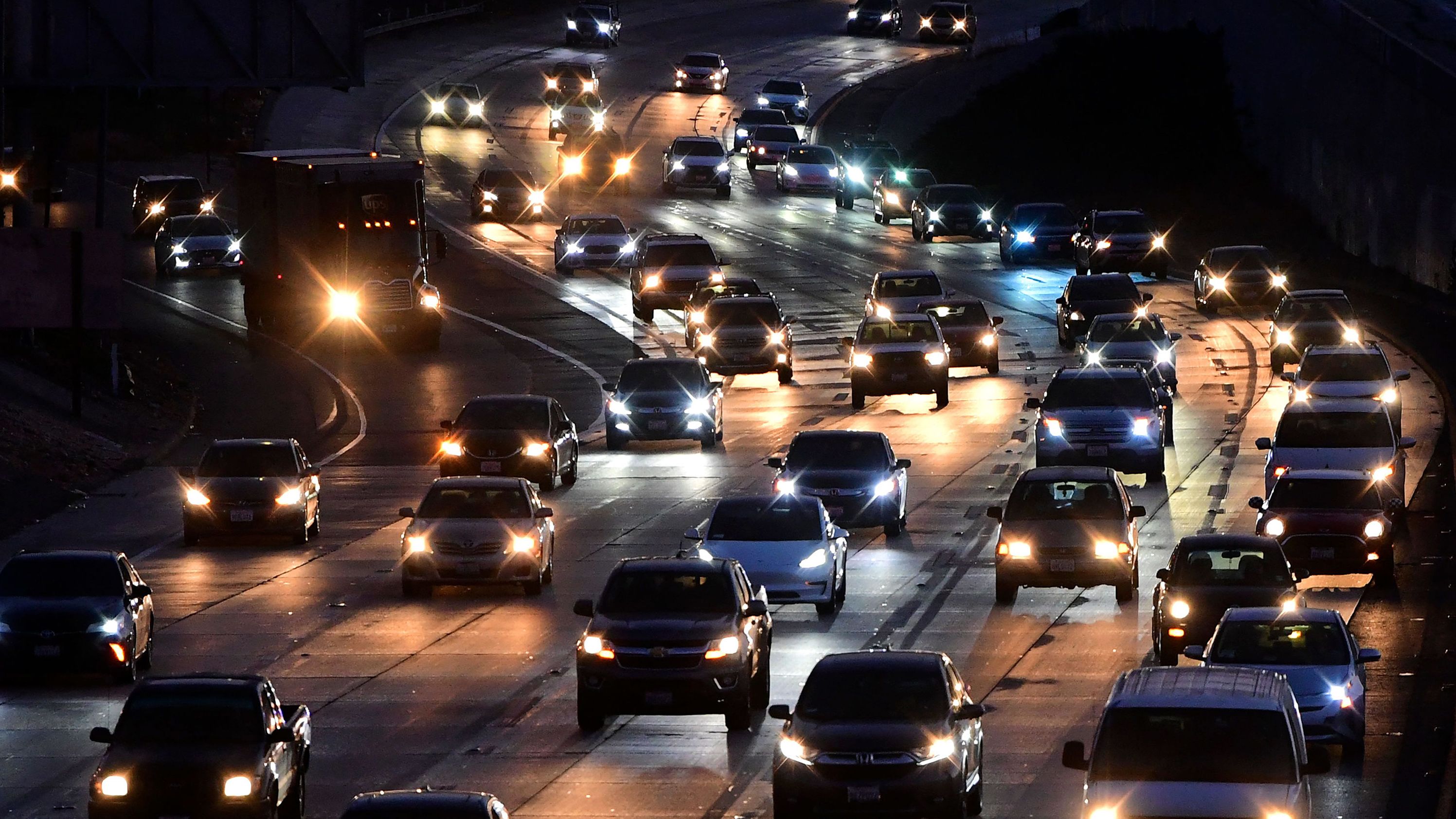 Vehicles head east out of Los Angeles on Interstate 10 in Alhambra, California, on Thursday. More than 37 million people were expected to travel 50 miles or more from home between Thursday and Monday, according to AAA.