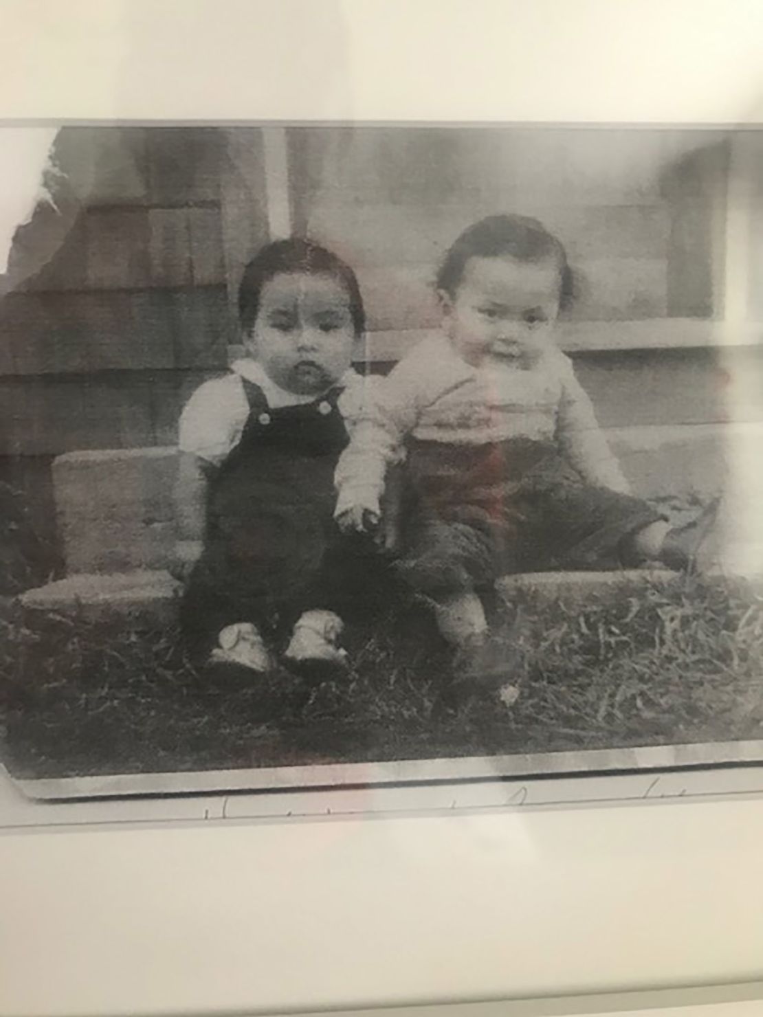 A childhood photo of Harvey McLeod, at left.