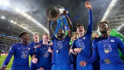 Antonio Ruediger of Chelsea celebrates with the Champions League Trophy following their team's victory in the UEFA Champions League Final between Manchester City and Chelsea FC at Estadio do Dragao on May 29, 2021 in Porto, Portugal.