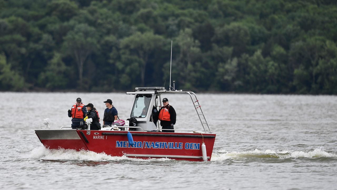 A boat team from the Metro Nashville Office of Emergency Management searches the water after the plane crash at Percy Priest Lake on Saturday.