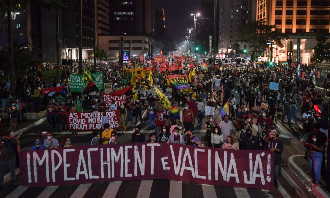 Demonstrators take part in a protest against Brazilian President Jair Bolsonaro's handling of the pandemic in Sao Paulo.