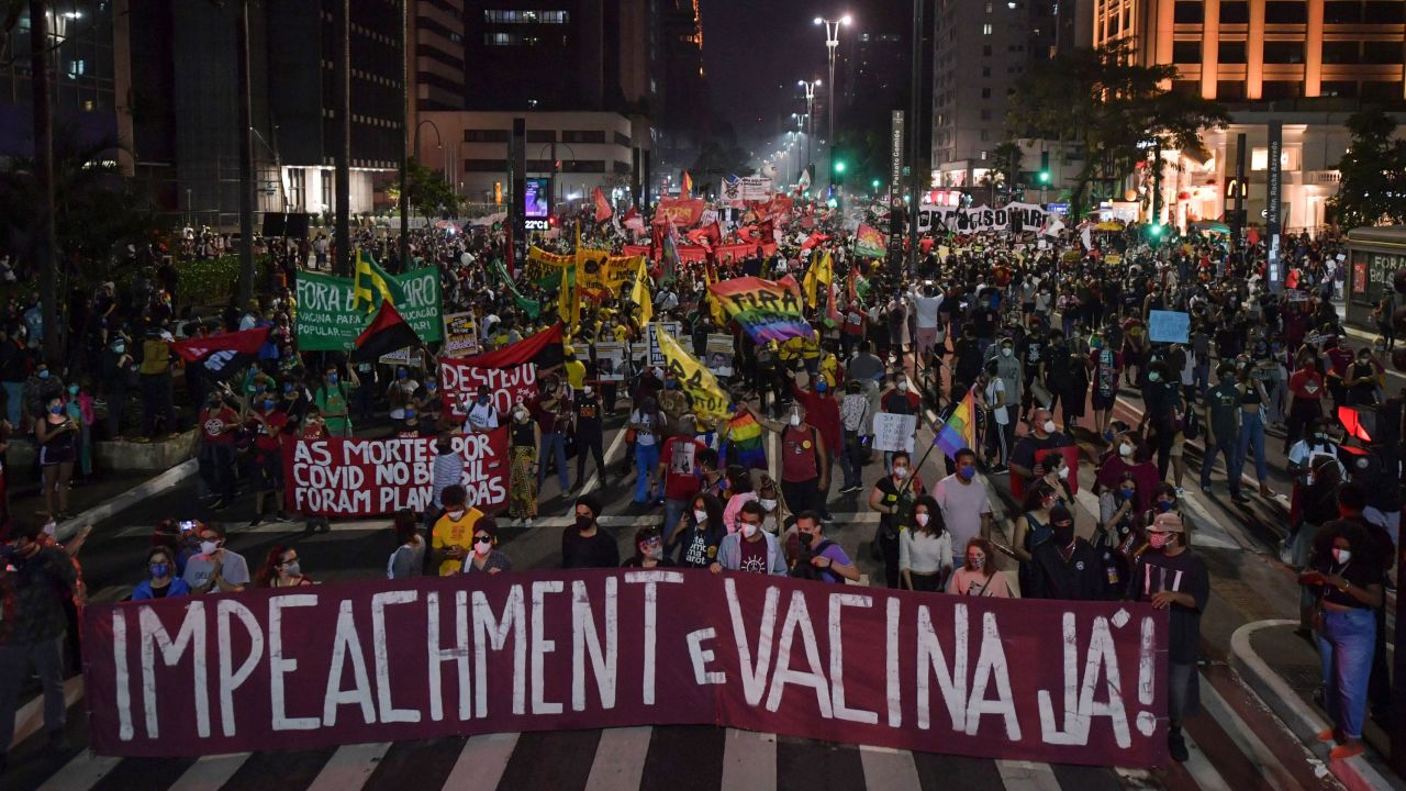 Demonstrators take part in a protest against Brazilian President Jair Bolsonaro's handling of the pandemic in Sao Paulo.
