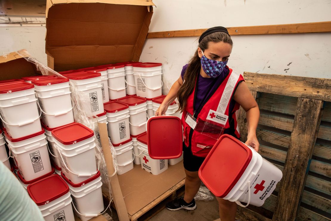 American Red Cross volunteer Casey Garnett unloads emergency cleaning kits after Hurricane Laura, in Georgetown, Louisiana, on Friday, September 4, 2020.
