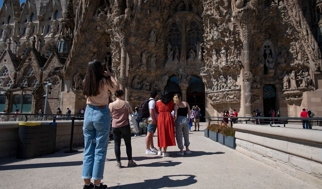 People visit the Sagrada Familia basilica in Barcelona on May 29, 2021. Spain plans to broaden entry to vaccinated travelers in June.