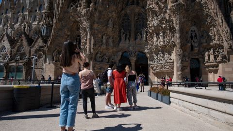 People visit the Sagrada Familia basilica in Barcelona on May 29, 2021. Spain plans to broaden entry to vaccinated travelers in June.