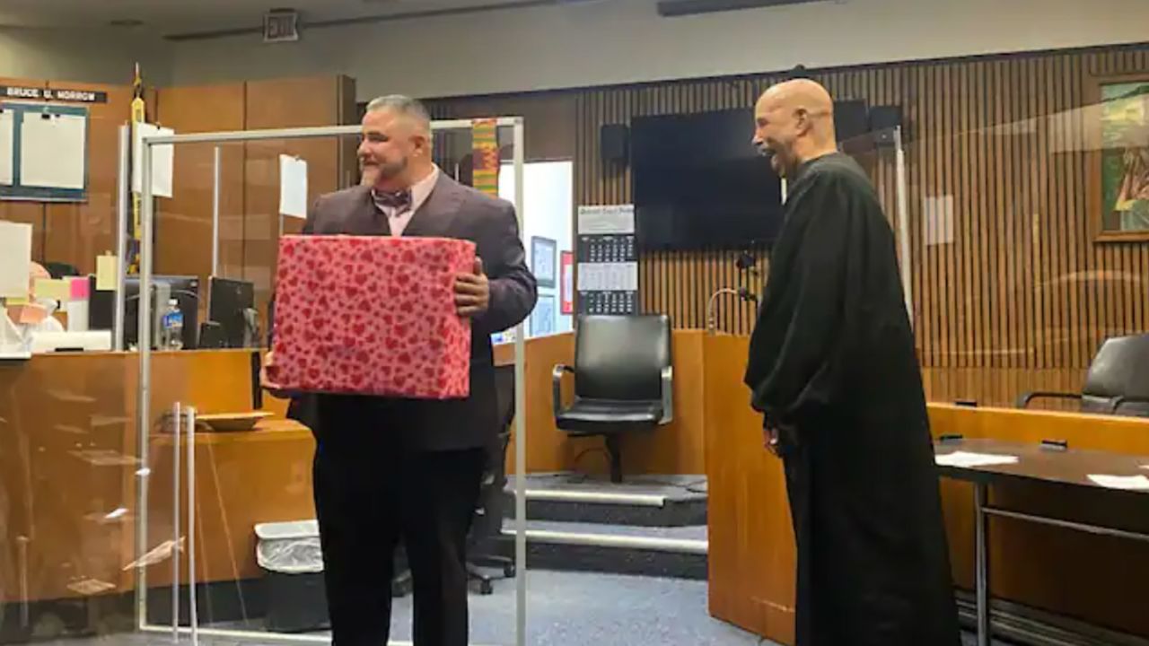 Attorney Edward Martell, left, stands beside Judge Bruce Morrow in the same courtroom where he appeared on drug charges 16 years ago. 