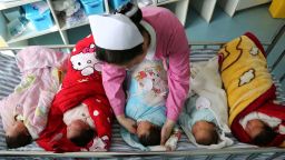 --FILE--A Chinese nurse attends newborn babies at a hospital in Xiangyang city, central China's Hubei province, 22 February 2018. China is reported to be planning to eliminate the law that says each family can only have two children. China, the most populous nation in the world, is said to be planning to remove all limits on the number of children a family can have, according to people familiar with the matter, in what would be a historic move to end to a policy that caused many controversial disputes and left the world's second-largest economy short of labor. The State Council, China's cabinet, has commissioned research on the repercussions of ending the country's policy which has lasts roughly four decades and intends to enact the change nationwide, said the people, who asked not to be named. The leadership wants to reduce the pace of aging in China's population and remove a source of international criticism, one of the people said.  (Imaginechina via AP Images)