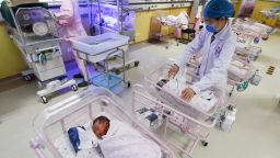 A newborn baby is seen being cared for in the ward of the hospital neonatal care center in Guyang, Anhui, China on April 25, 2021.