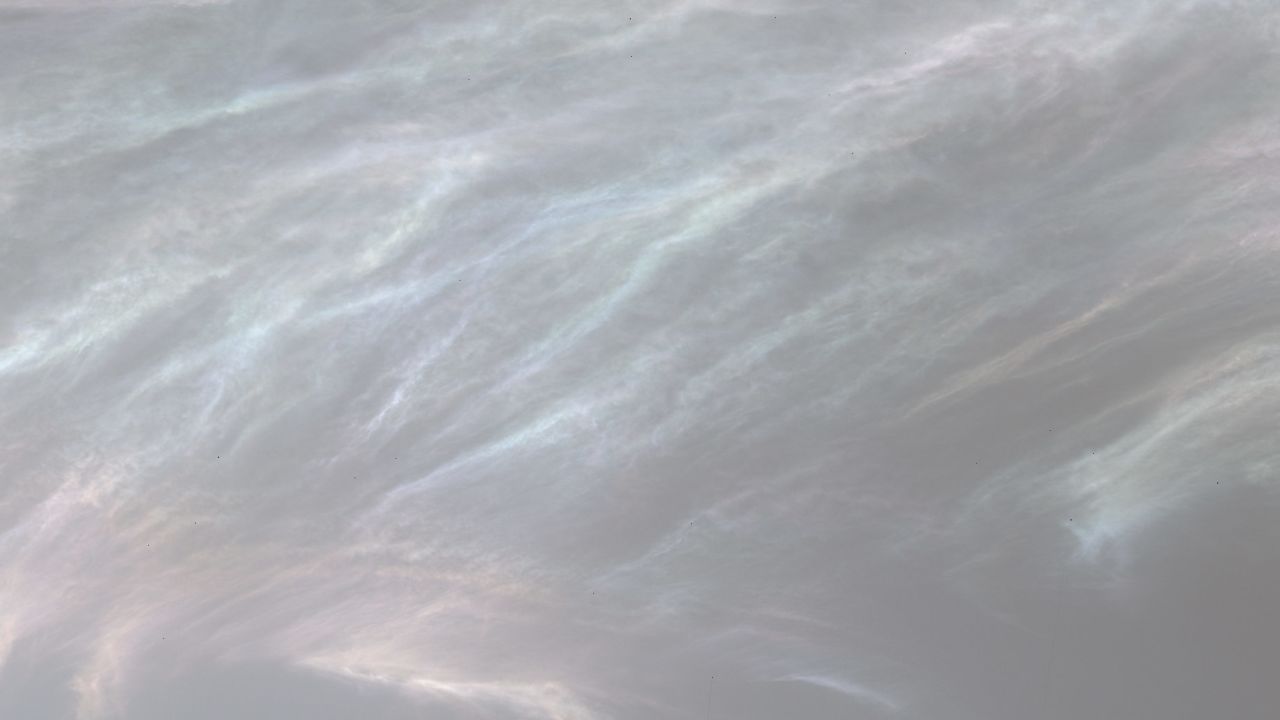 The Curiosity rover spotted these iridescent, or "mother-of-pearl," clouds on Mars in March.