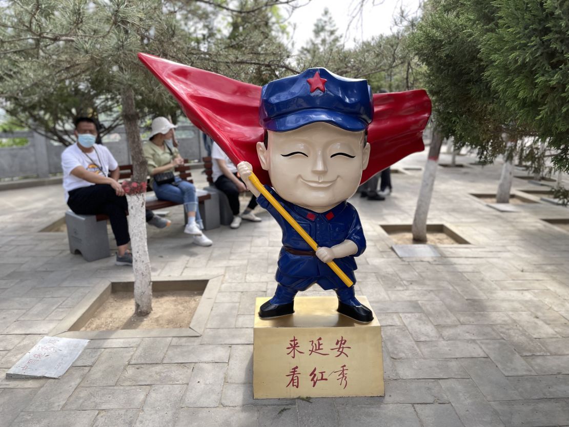 A cartoon character in Yan'an, a "red site" in northern Shaanxi province, which advertises a stage extravaganza on the Communist Party's early days.