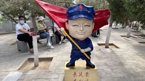 A cartoon character in Yan'an, a "red site" in northern Shaanxi province, which advertises a stage extravaganza on the Communist Party's early days.