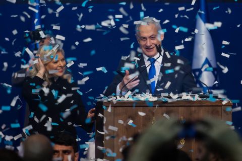Netanyahu and his wife, Sara, attend a Likud party celebration in Tel Aviv, Israel, in March 2020. Likud won 59 seats in the general election but came up three seats short of a majority.
