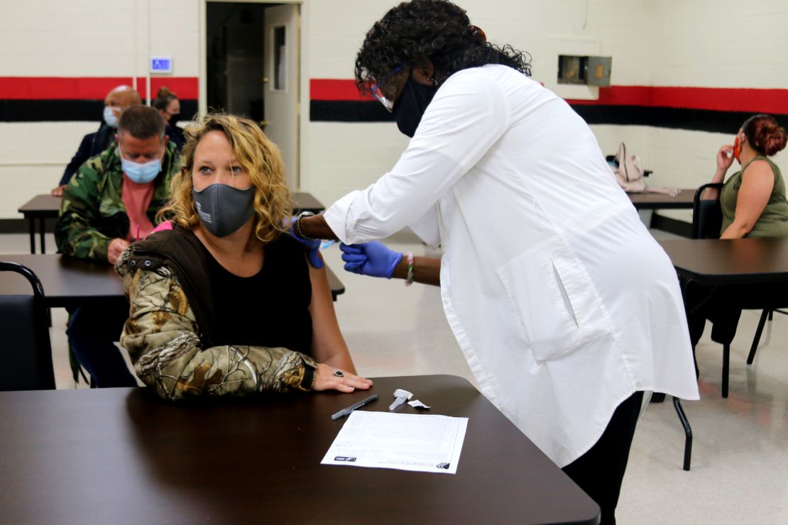 Nurse Joyce Barlow, right, gives the Covid-19 vaccine to a resident in Cuthbert, Georgia, at a vaccine clinic organized by local volunteers.