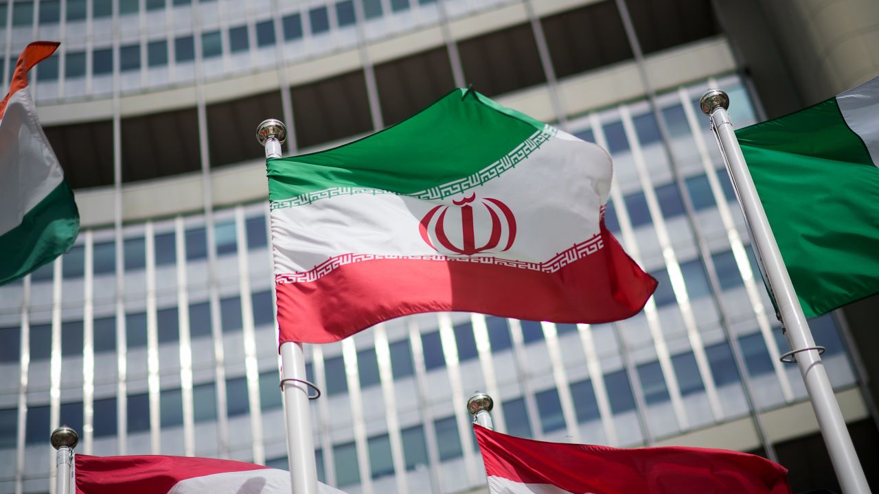 The flag of Iran is seen in front of the building of the International Atomic Energy Agency (IAEA) Headquarters on May 24, 2021 in Vienna, Austria.