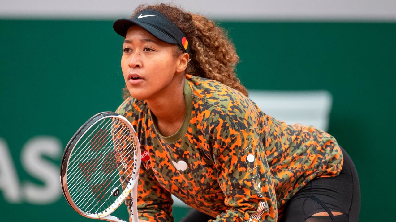 Naomi Osaka preparing for the French Open  during a practice match against Ashleigh Barty of Australia.