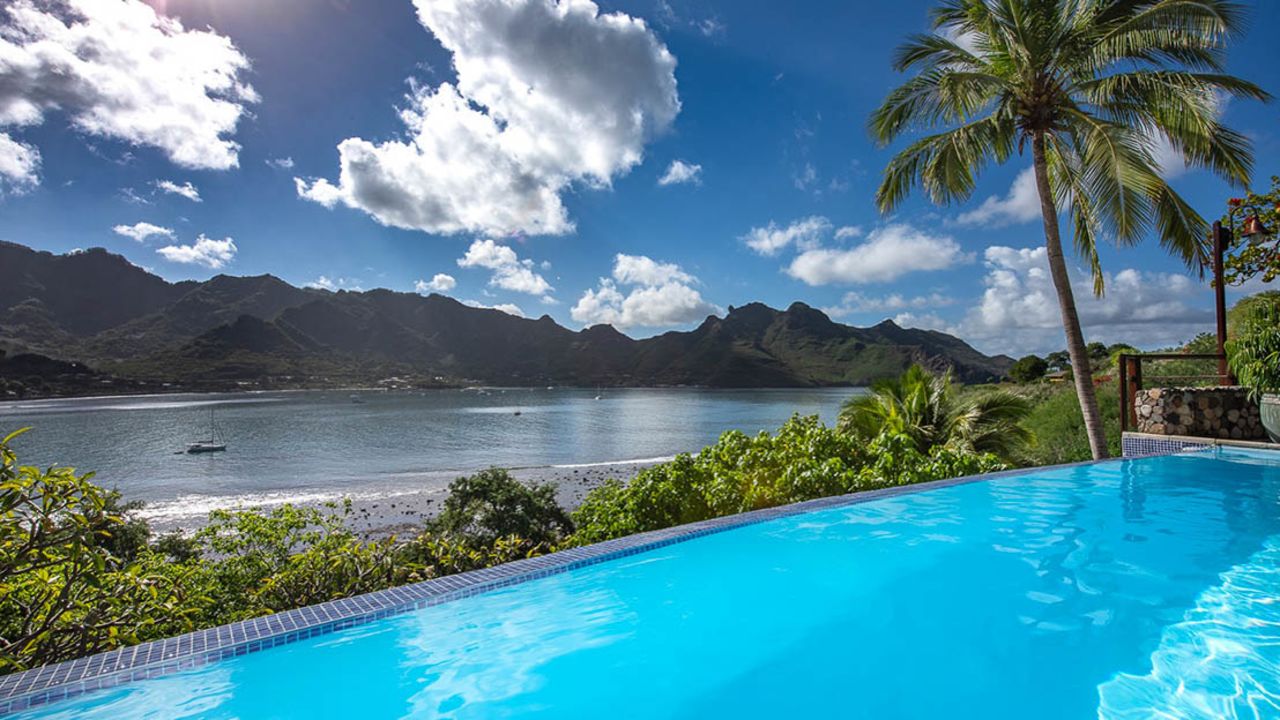 The infinity pool at Le Nuku Hiva by Pearl Resorts overlooks Taiohae Bay.