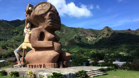 The 40-foot-tall Tiki Tuhiva sculpture looms over Taiohae.