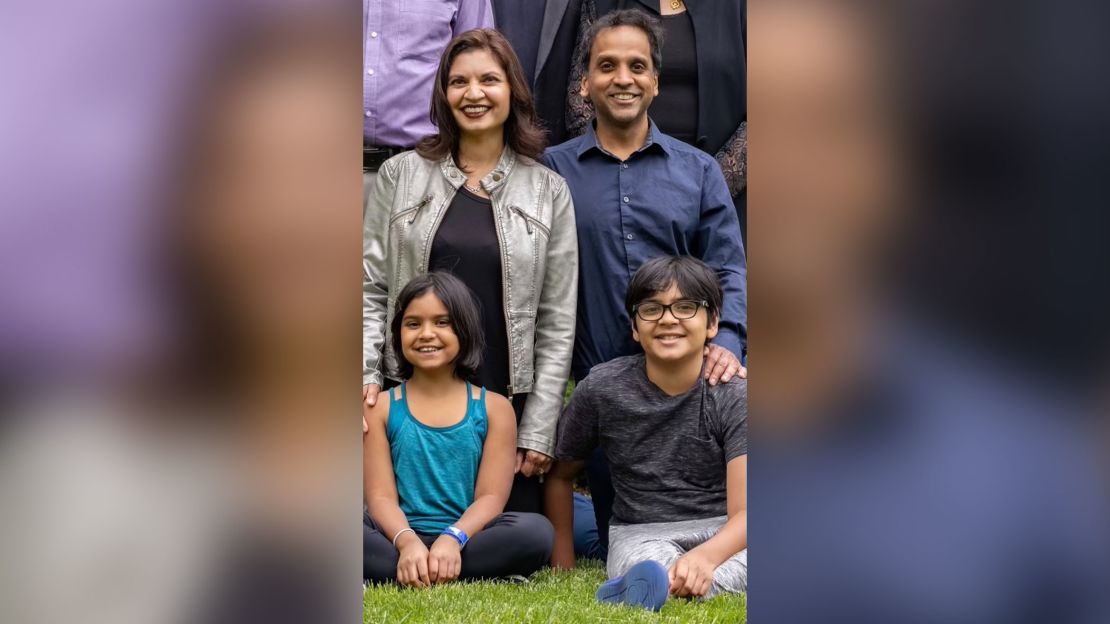 Rai Goyal (lower right corner) with his parents and sister.