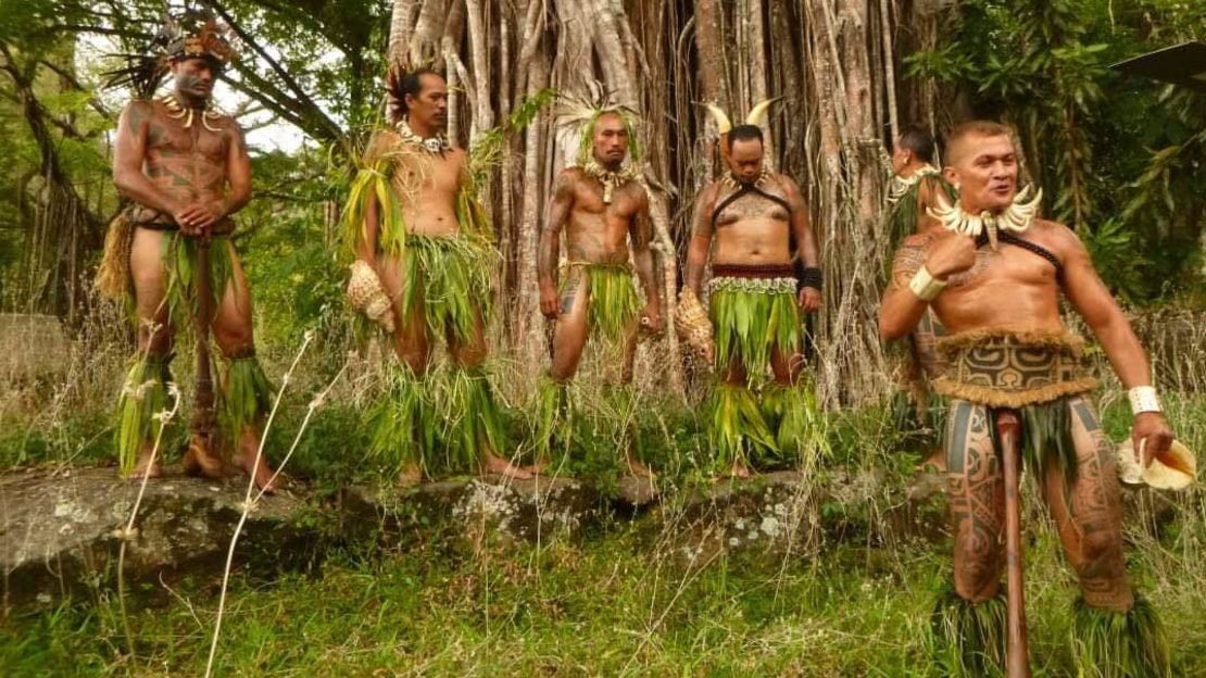 William Teikitohe, right, gives cultural tours of the island.