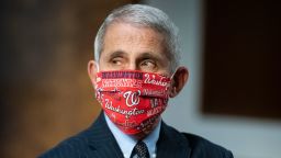 WASHINGTON, DC - JUNE 30: Dr. Anthony Fauci, director of the National Institute of Allergy and Infectious Diseases, wears a Washington Nationals protective mask while arriving to a Senate Health, Education, Labor and Pensions Committee hearing on June 30, 2020 in Washington, DC. Top federal health officials are expected to discuss efforts to get back to work and school during the coronavirus pandemic. (Photo by Al Drago - Pool/Getty Images)