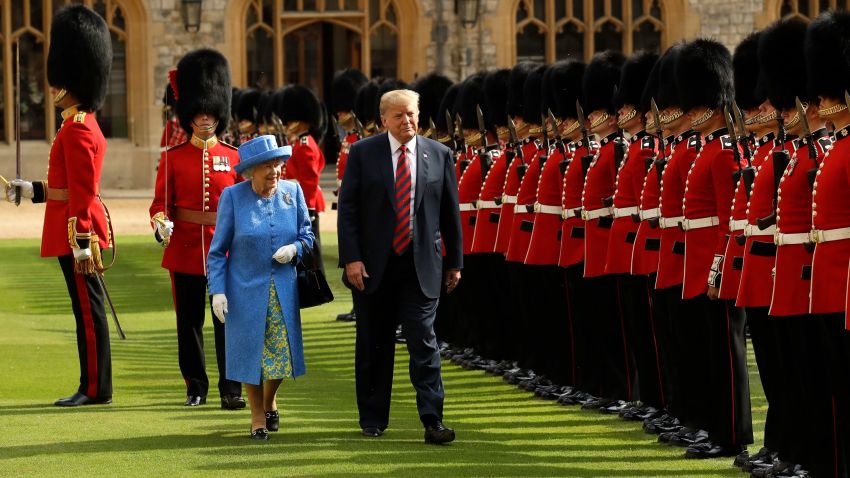 WINDSOR, ENGLAND - JULY 13:  U.S. President Donald Trump and Britain's Queen Elizabeth II inspect a Guard of Honour, formed of the Coldstream Guards at Windsor Castle on July 13, 2018 in Windsor, England.  Her Majesty welcomed the President and Mrs Trump at the dais in the Quadrangle of the Castle. A Guard of Honour, formed of the Coldstream Guards, gave a Royal Salute and the US National Anthem was played. The Queen and the President inspected the Guard of Honour before watching the military march past. The President and First Lady then joined Her Majesty for tea at the Castle.  (Photo by Matt Dunham/WPA Pool/Getty Images)