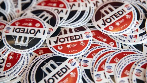 Stickers reading "I voted" are seen on a table at a polling station in Brooklyn borough of New York, November 3, 2020.