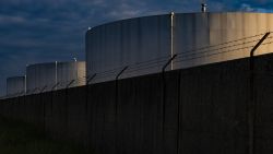 Fuel storage tanks connected to the Colonial Pipeline Co. system in an industrial area of the Port of Baltimore in Baltimore, Maryland, U.S., on Tuesday, May 11, 2021. Fuel shortages are expanding across several U.S. states in the East Coast and South as filling stations run dry amid the unprecedented pipeline disruption caused by a criminal hack. Photographer: Samuel Corum/Bloomberg via Getty Images