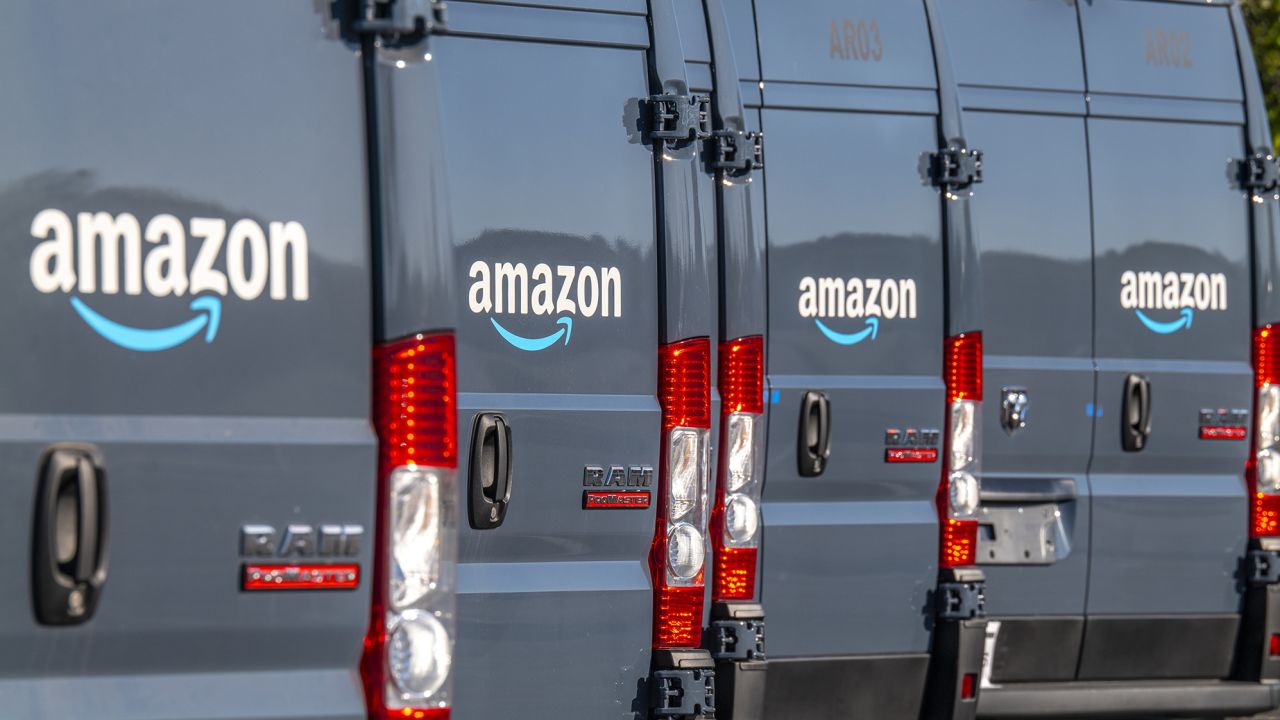 Amazon.com delivery trucks in Richmond, California, U.S., on Tuesday, Oct. 13, 2020. 