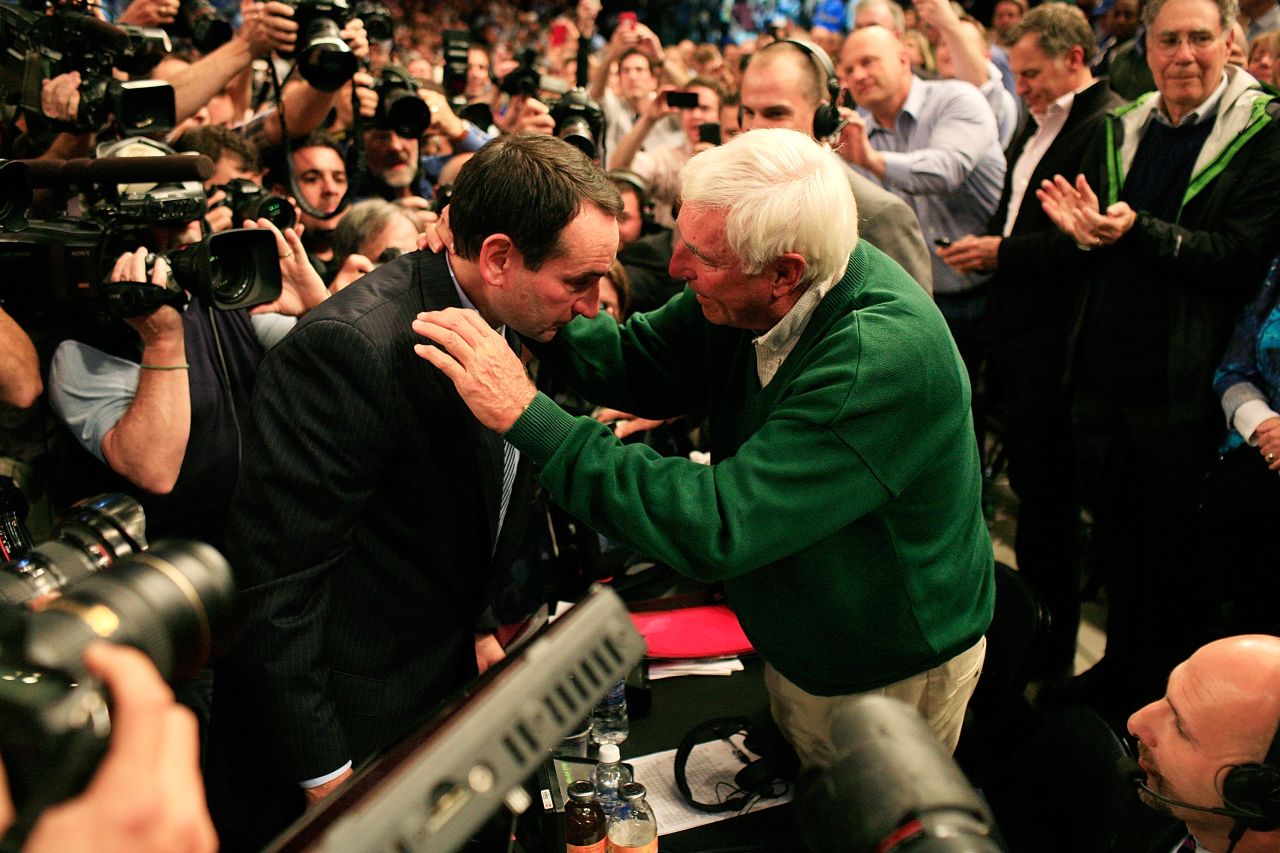 Krzyzewski and Knight embrace after Krzyzewski broke Knight's record for most Division I coaching wins in 2011. Knight was at the game serving as a television commentator.