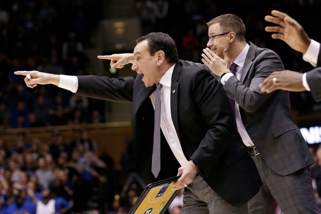 Duke head coach Mike Krzyzewski directs his team during the second half of an NCAA college basketball game against Stephen F. Austin in Durham, North Carolina.