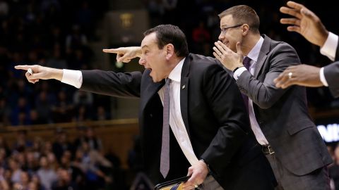 Duke head coach Mike Krzyzewski directs his team during the second half of an NCAA college basketball game against Stephen F. Austin in Durham, North Carolina.