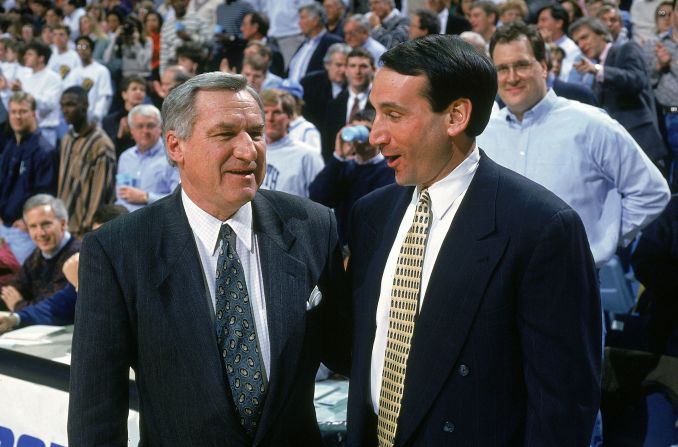 Krzyzewski and his longtime coaching rival, North Carolina's Dean Smith, chat before a game in 1994. Smith retired in 1997.